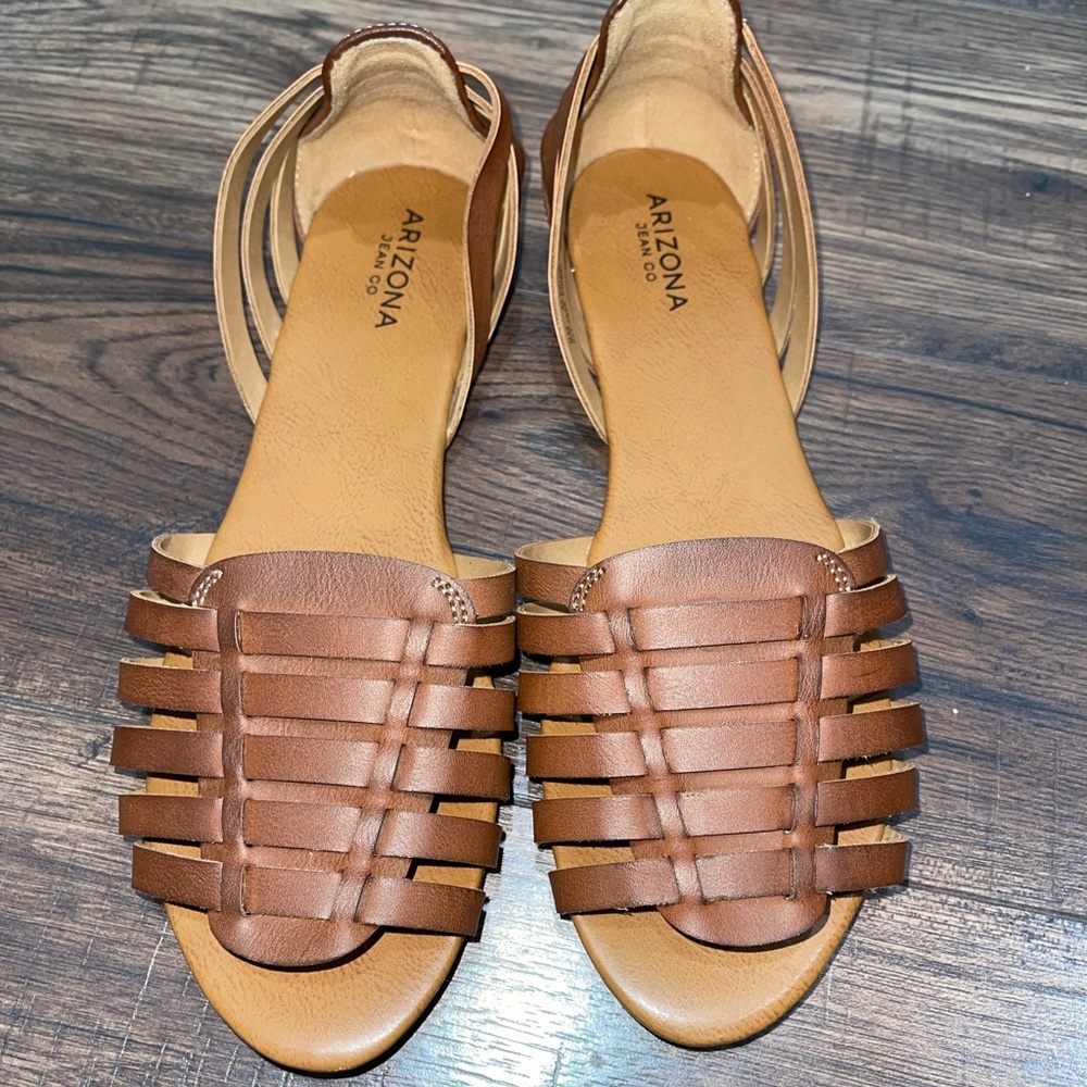 Brown leather flats